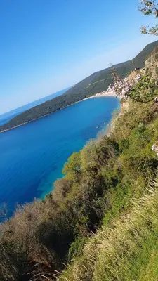 a view of a body of water from a hill at Meli Apartman in Krimovice