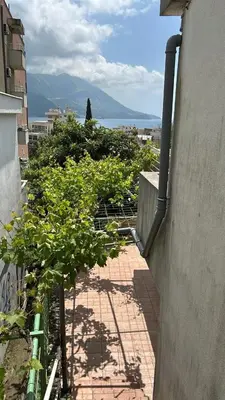 a balcony with plants on the side of a building at Casa Verde in Boreti