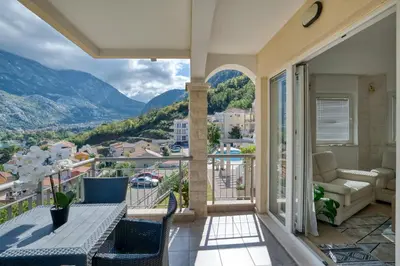 a balcony with a view of the mountains at Kotor Vista Seaview apartment by MN Property in Muo
