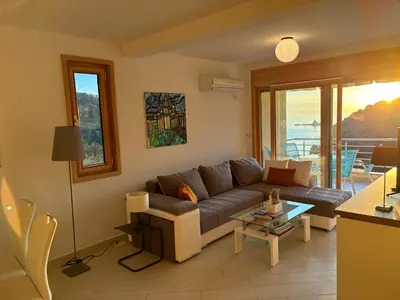a living room with a couch and a table at Villa Nova Premium Apartment No 8 in Petrovac na Moru