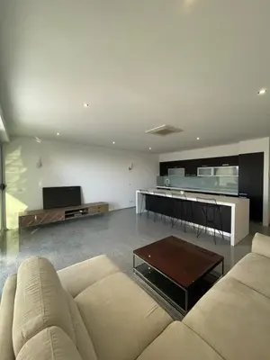 a living room with a couch and a table at Casa Klei in Ulcinj