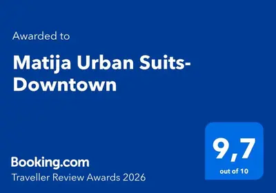 a blue rectangle with the wordsmaika ukrainian suites downtownt at Matija Urban Suits- Downtown in Podgorica