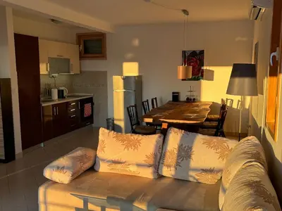 a living room with a couch and a table at Villa Nova Premium Apartment No 5 in Prijevorac