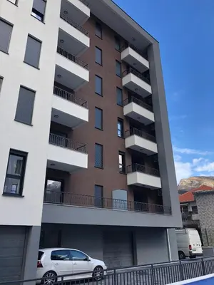 a car parked in front of a building at Sweet Escape in Bar