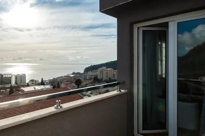 a view of the ocean from a balcony at Apartment Taurus in Petrovac na Moru