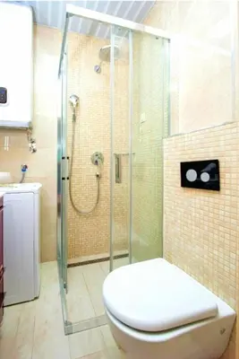 a bathroom with a glass shower and a toilet at Apartman BJANKA in Budva