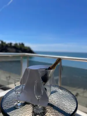 a table with two wine glasses and a knife at Vue Mer in Ulcinj