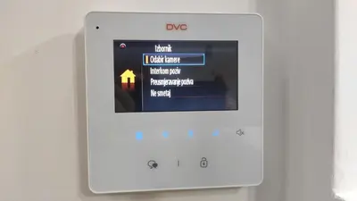 an ipod with the dmo app on it at AJKULICA Apartman in Bar
