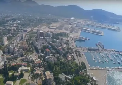 an aerial view of a city and a harbor at Studios Zoran Milosev in Bar