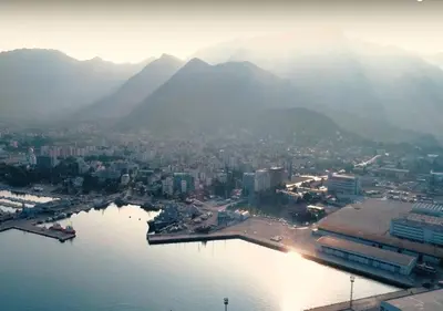 an aerial view of a city next to a body of water at Studios Zoran Milosev in Bar