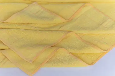 a close up of a yellow scarf at Apartmani Jovan in Budva