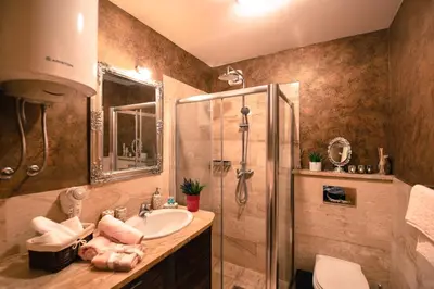 a bathroom with a sink and a shower at Marilyn Apartment in Budva