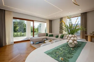 a living room with a couch and a table at Villa Del Sol in Budva