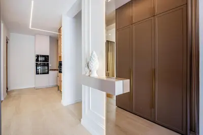a hallway with a large brown closet in a house at Villa Del Sol in Budva