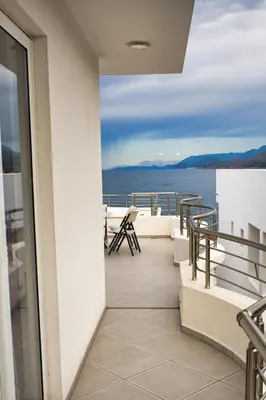 a balcony with a view of the water at Villa Perla in Utjeha