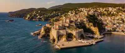 an aerial view of a town on an island in the water at Family Apartments Pepic in Ulcinj