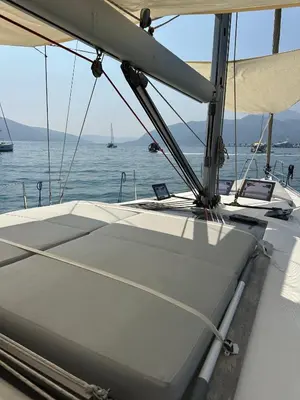 a boat on the water with a view of the ocean at Yacht Hotel Kotor Marina in Kotor