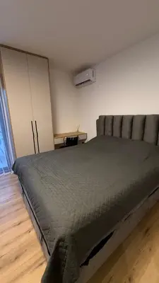 a bedroom with a large bed in a room at Luxury Home in Dobra Voda