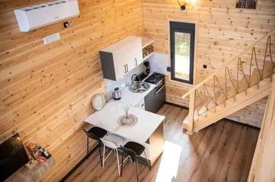 an overhead view of a kitchen in a log cabin at RAOS Cottage in Ulcinj