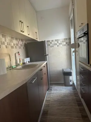 a kitchen with a sink and a counter top at Monte Budva in Budva