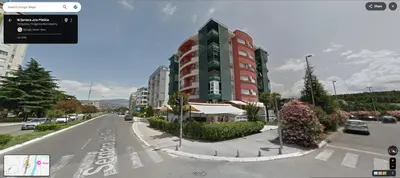 a rendering of a building on a city street at Riverview in Podgorica