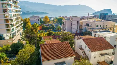 an aerial view of a city with buildings at Apartments Luka in Budva