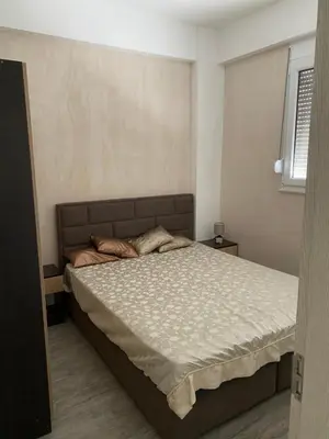 a bedroom with a large bed in a room at Apart Bella Utjeha Sea View 68 qm in Utjeha