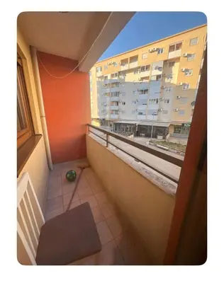 a balcony with a view of a large building at Sshome in Podgorica