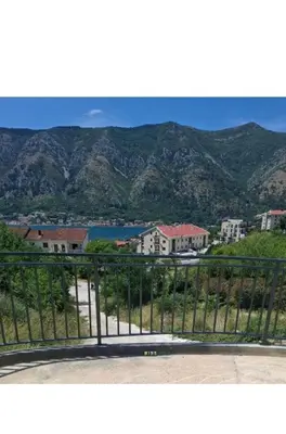 a view from a balcony with mountains in the background at Green Harmony in Kotor