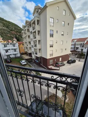 a view of a building from a balcony at Budva apartman Vasić in Budva