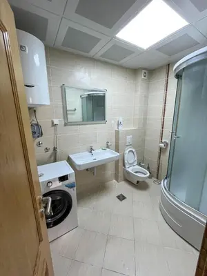 a bathroom with a sink and a toilet at Sky apartment - Becici in Becici