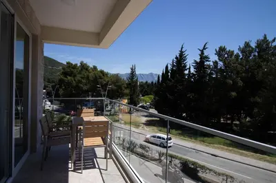 a balcony with a view of a road at Alpesa Apartments in Budva