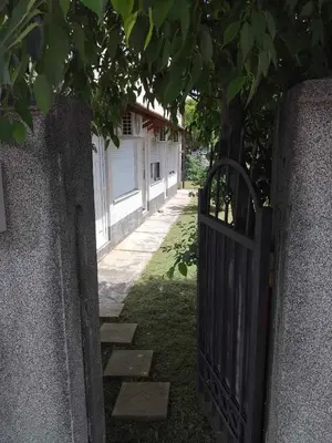 an entrance to a house with a gate at Nikolaj in Podgorica