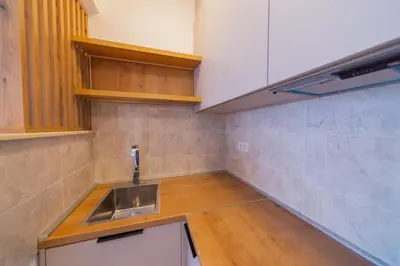 a kitchen with a sink and a counter top at Luča Apartments in Budva