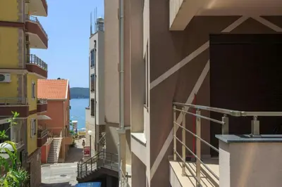a view from a balcony of a building at Sea Point apartment Korda in Budva