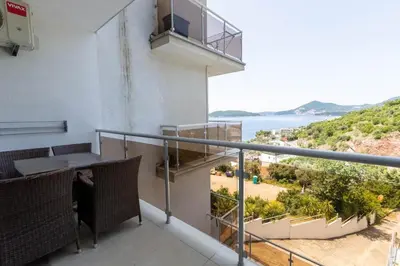a balcony with a view of the ocean at Hana in Pržno