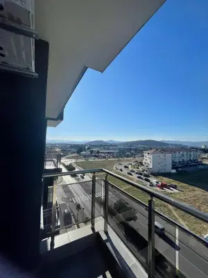 a balcony with a view of a parking lot at Studio 78 - Tuški put in Podgorica