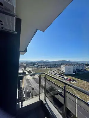 a balcony with a view of a parking lot at Studio 78 - Tuški put in Podgorica