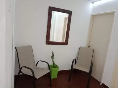 two chairs and a mirror in a room at Studio Dream III soba in Bar