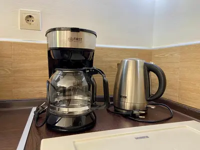 a blender and a coffee pot on a counter at Fiumera Kotor Apartment in Kotor