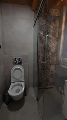a bathroom with a toilet and a shower at Villa Ana in Ulcinj