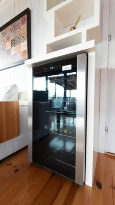 a microwave oven sitting on the floor in a room at Villa Ana in Ulcinj