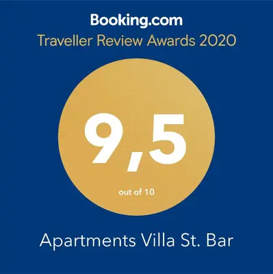 a yellow circle with the number five and the text travelling review awards at Apartments Villa St. Bar in Bar