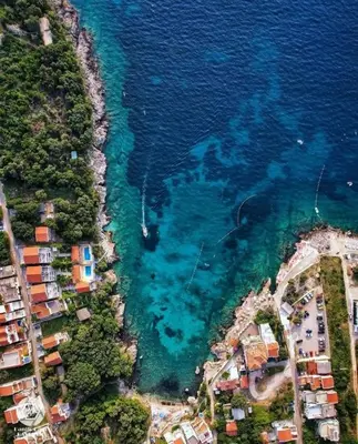 an aerial view of a beach and the ocean at Apartment Complex with Pool in Bar, Montenegro in Bar