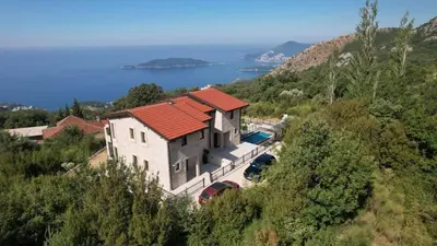 an aerial view of a house on a hill at Villa Trend, Budva, Kuljače in Budva