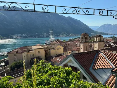 a city with a view of the water and buildings at Panoramic view ! Rooftop garden - Old Town studio in Kotor