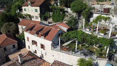an aerial view of a building in a city at Panoramic view ! Rooftop garden - Old Town studio in Kotor