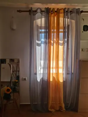 a group of curtains hanging in a room at Romantic Escape - Stunning Rooftop Views - Old Town in Kotor