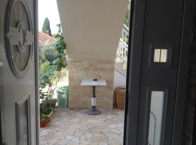 a view of a patio from the door of a house at Vila Dube in Ulcinj