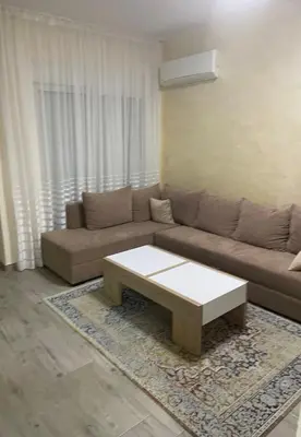a living room with a couch and a coffee table at Leilighet i ulcinj in Ulcinj